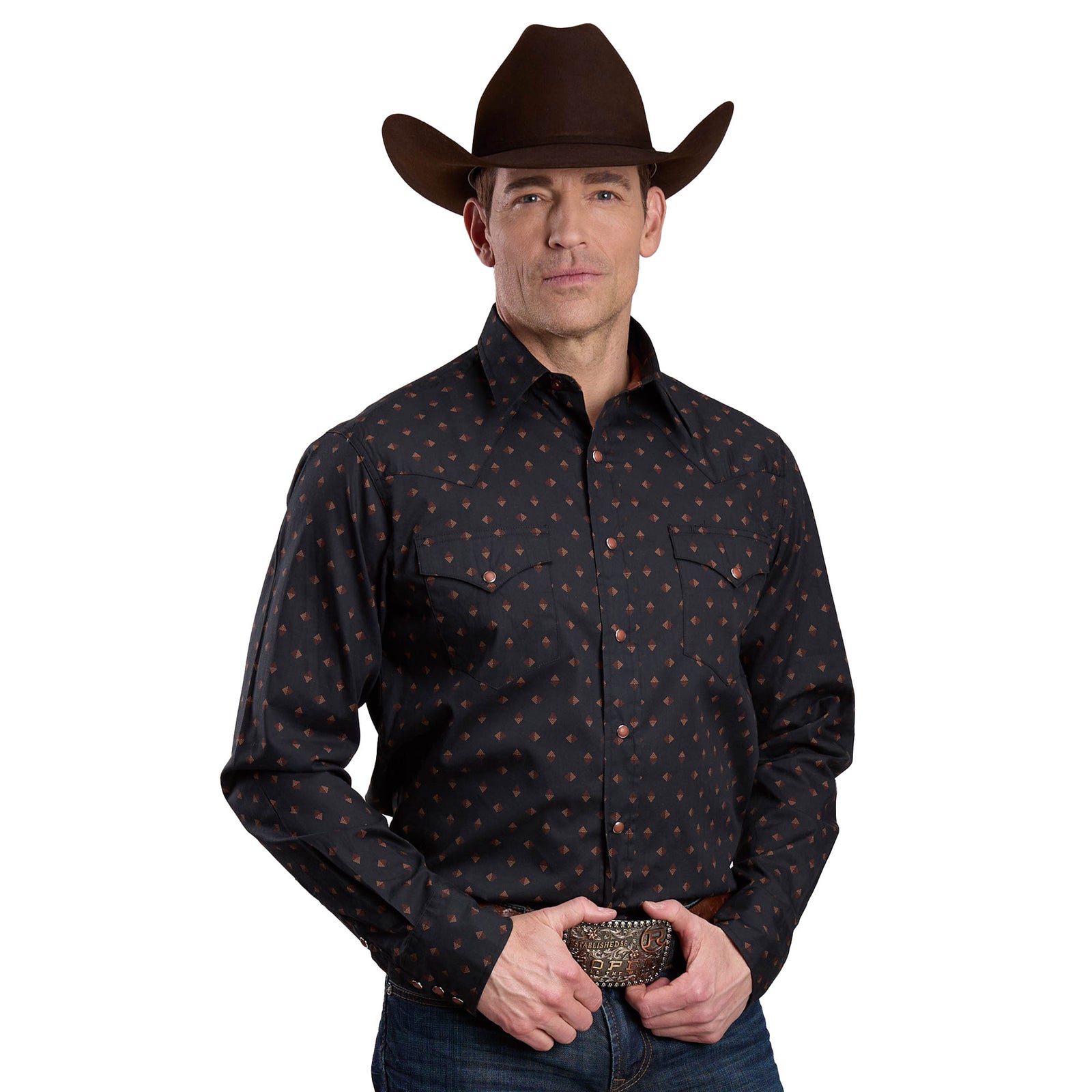 Roper Men's West Made L/S Western Shirt. Man wearing a dark patterned shirt and brown cowboy hat on a white background