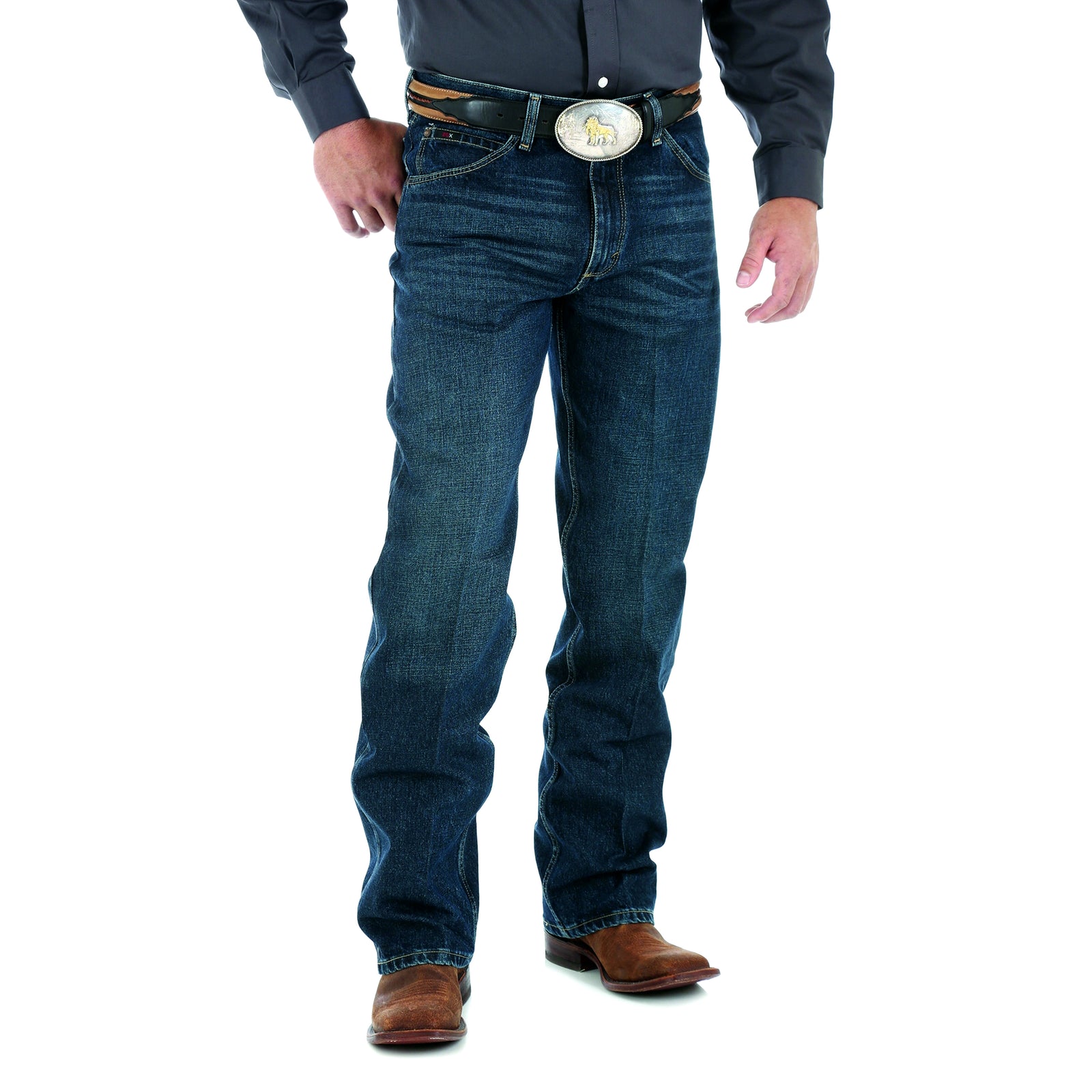 Wrangler Men's 20X Competition Jean. A man standing straight, wearing Wrangler Men's 20X Competition Jean in a deep blue color, with a relaxed fit and a belt.