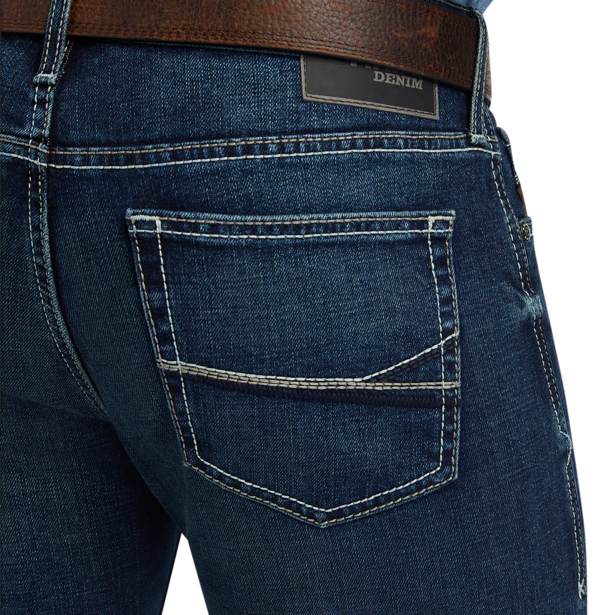 Close-up of blue denim jeans with a brown belt and 'Denim' label.