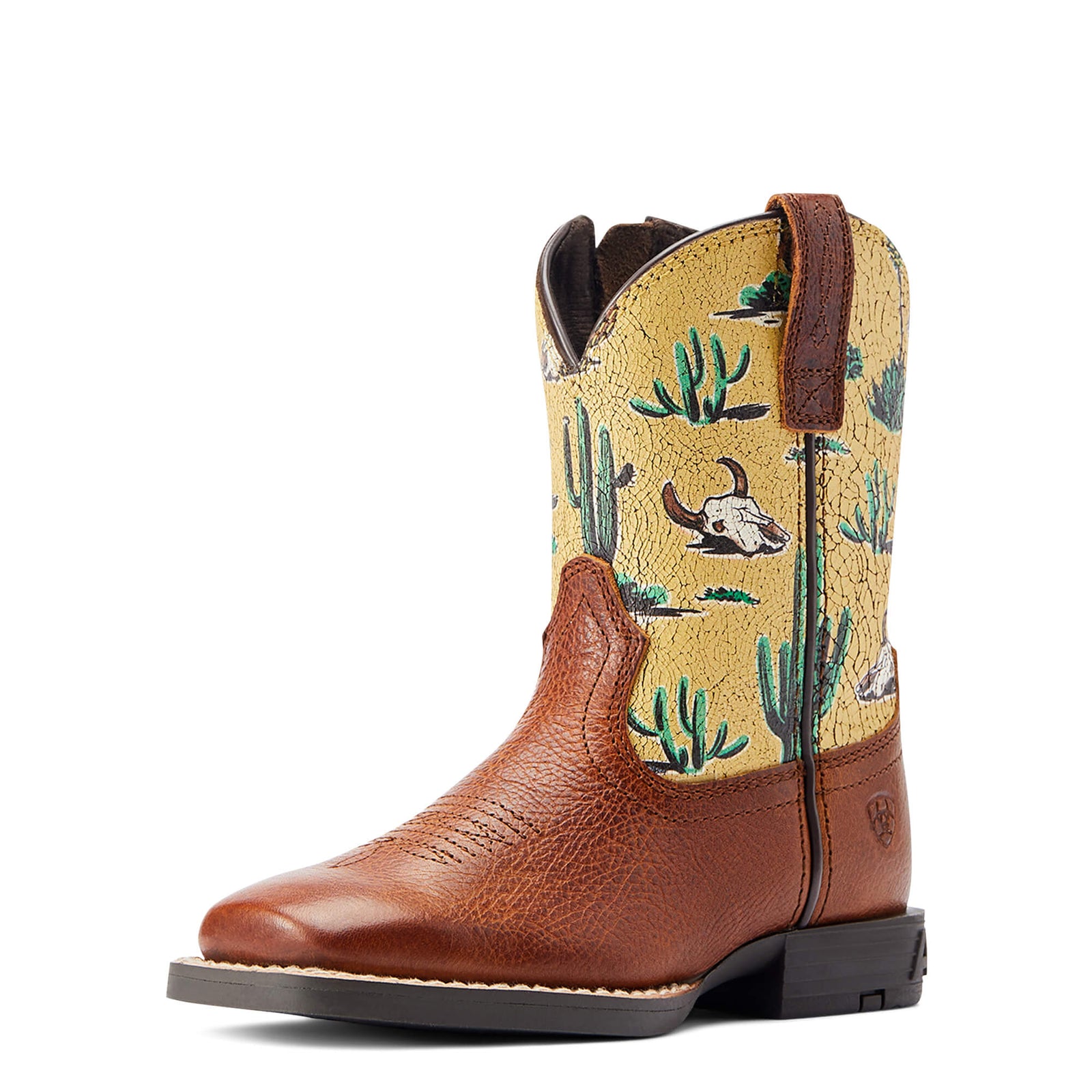 Ariat Round Up Lil Children's Western Boot. A child's western boot with a brown full-grain leather foot and a yellow printed or embossed leather upper featuring a desert pattern with cacti and a horse.
