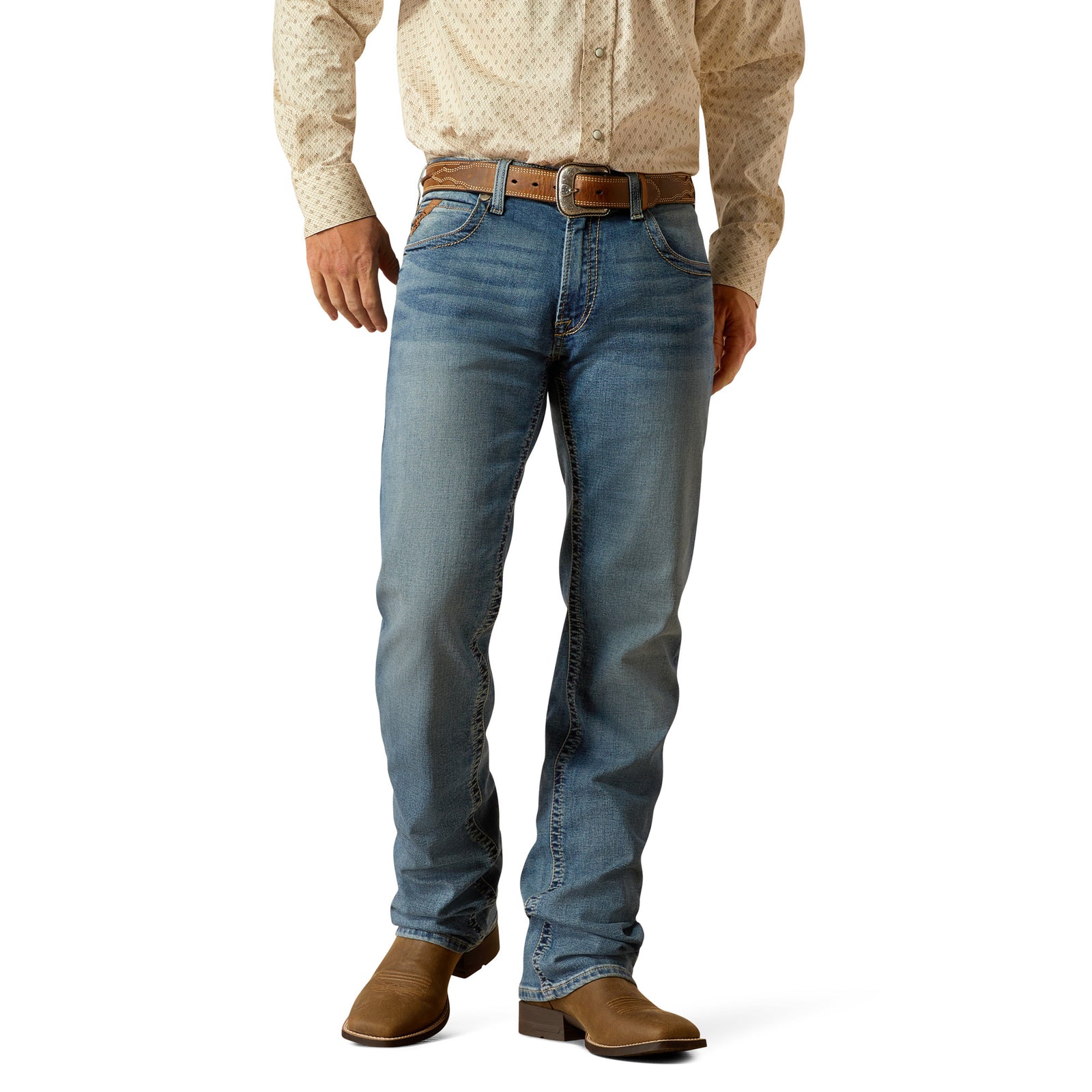 Ariat Men's M5 Redmond Straight Leg Jean. A man wearing a pair of blue straight leg jeans with a button-up shirt and brown leather boots.
