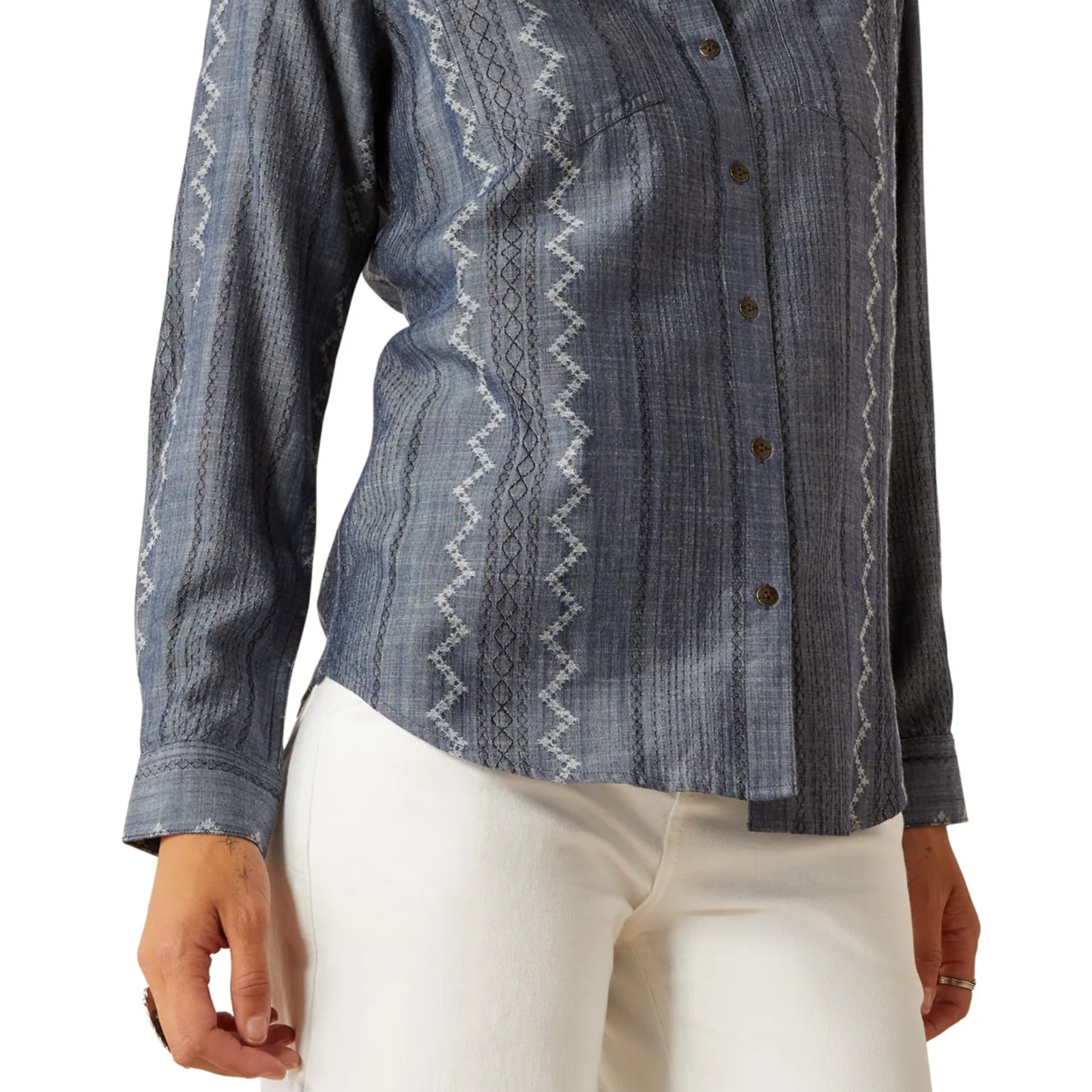 Ariat Women's Billie Jean L/S Western Shirt. Blue patterned shirt with white pants on a white background
