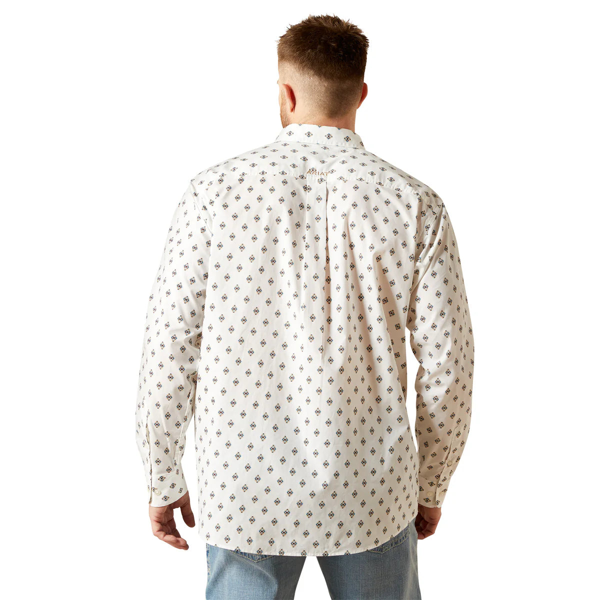 Man wearing a white patterned shirt on a white background