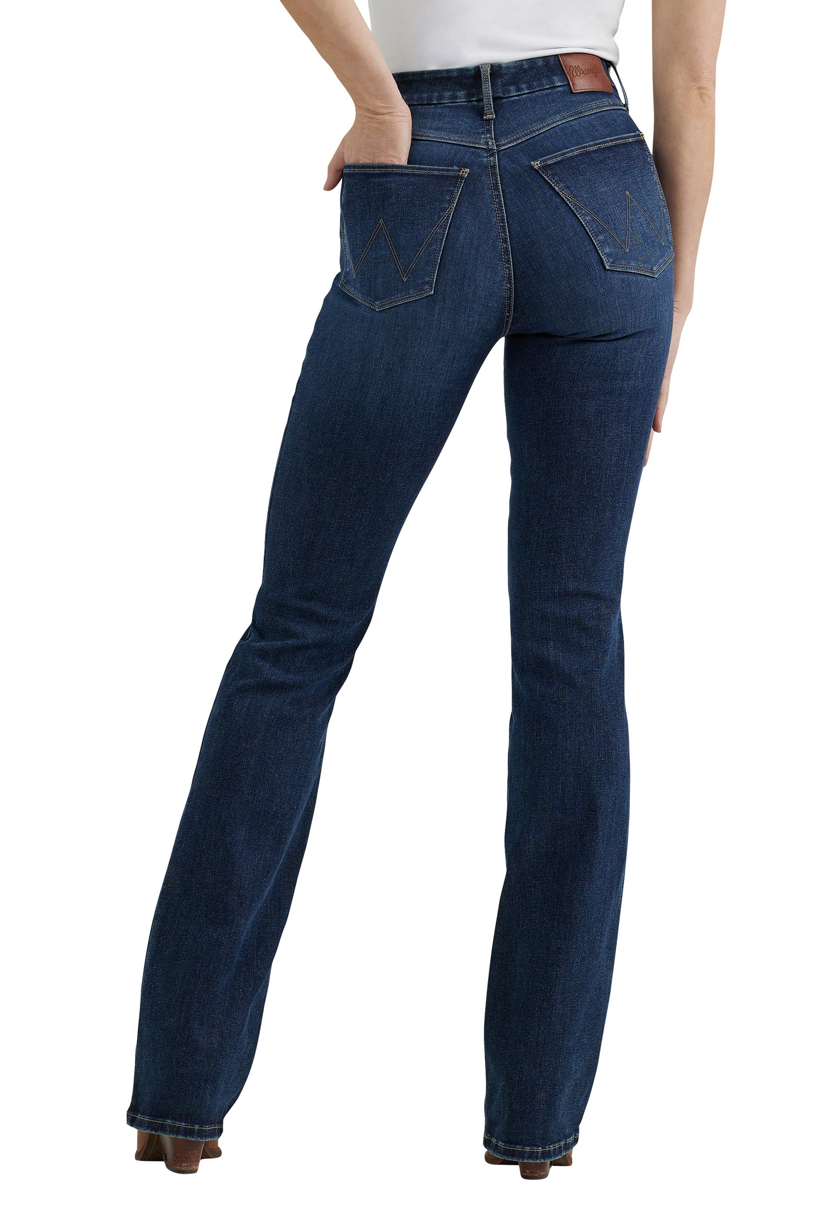 Wrangler Women's Bespoke High Rise Boot Cut Jean. Blue jeans worn by a person on a white background