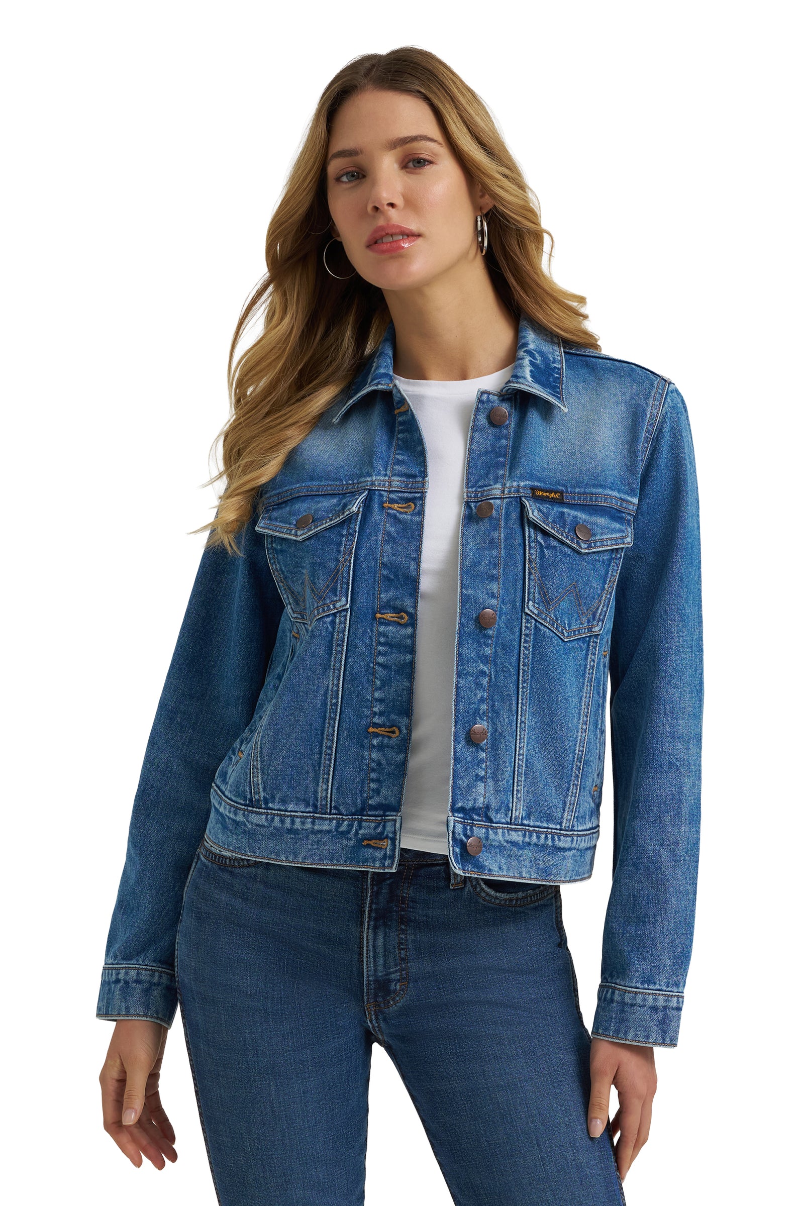 Woman wearing a blue denim jacket on a white background