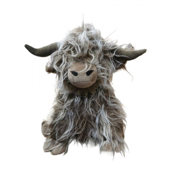 A Highland cow plush toy with shaggy gray and white fur, dark brown horns, and a beige snout, shown against a plain white background.