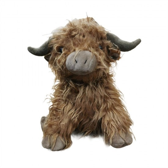 A shaggy Highland cow plush toy with long brown fur, dark gray horns, and a gray snout, sitting against a plain white background.