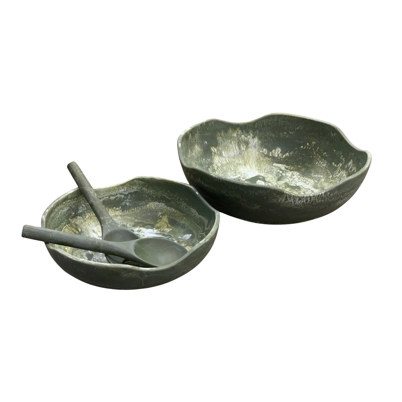 Two stone bowls with a spoon on a white background