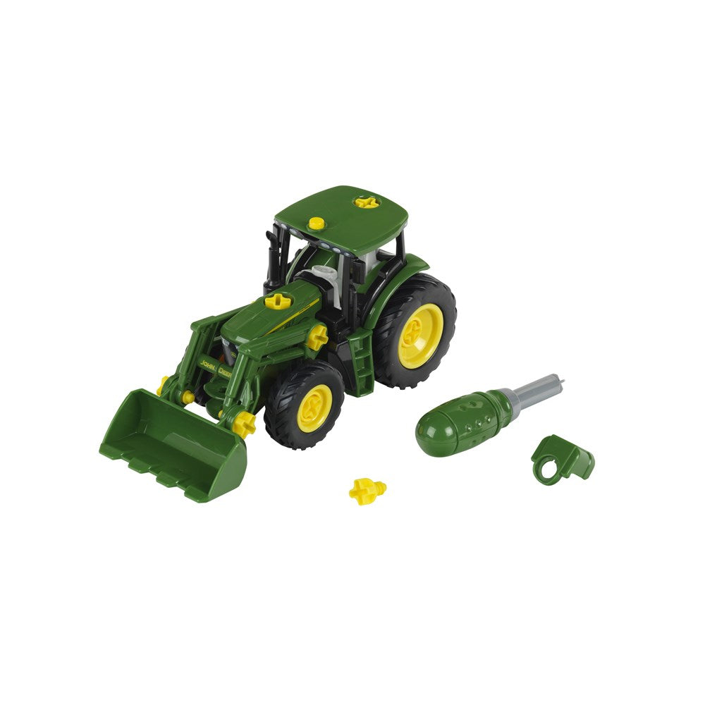 Toy tractor with detachable parts on a white background