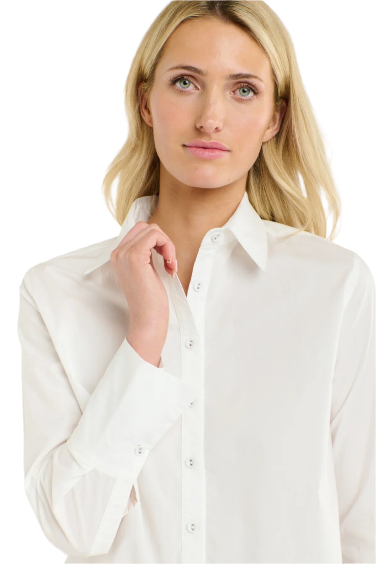 Close up of a woman wearing a 365 Women's Classic L/S Shirt. White button-up shirt on a white background