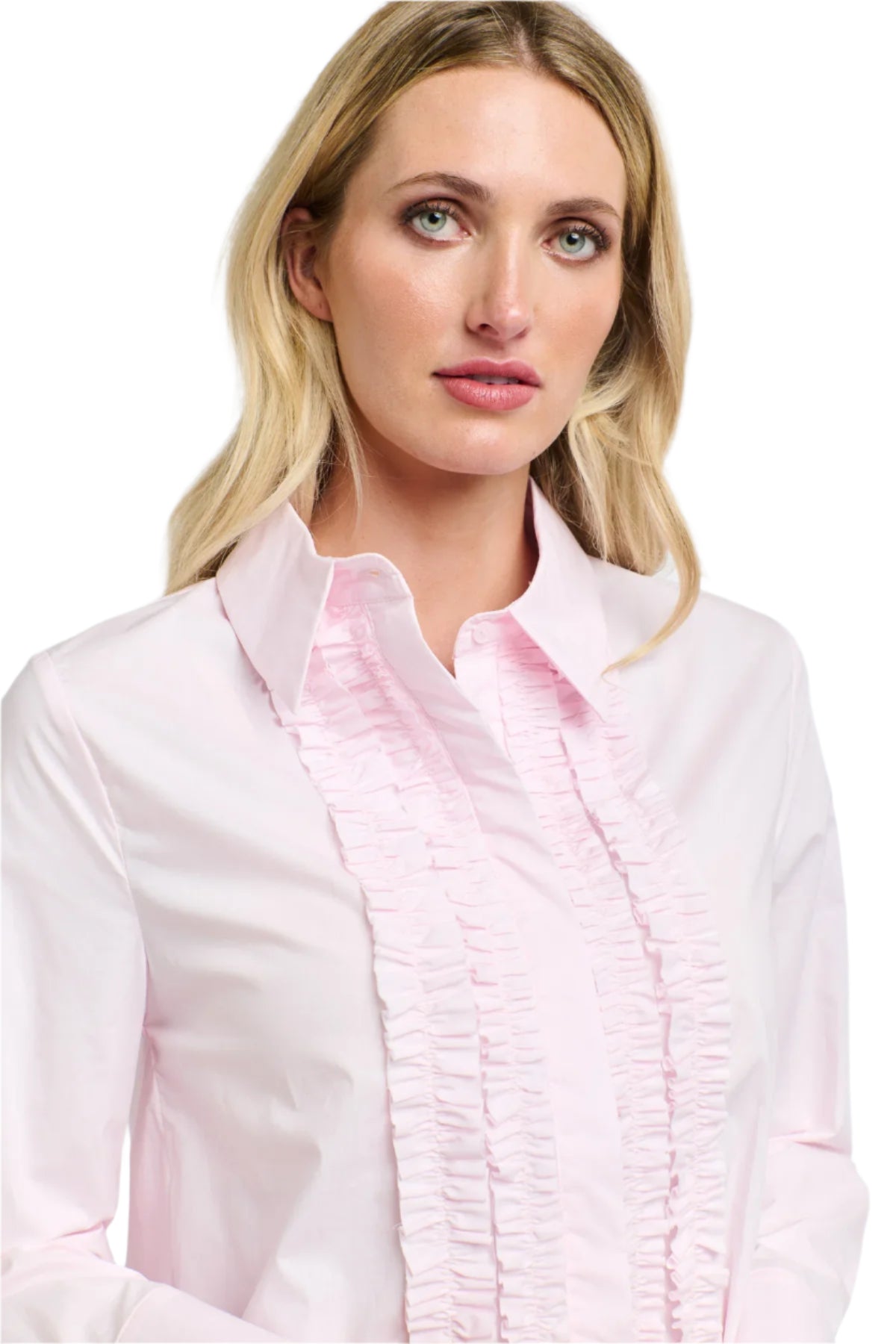 A close up view of a woman wearing a 365 Women's Tuxedo Shirt. A light pink blouse with ruffled details on a white background