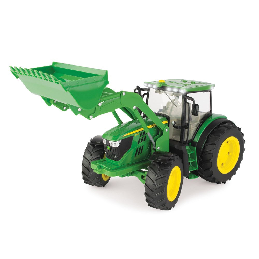 John Deere 1:16 JD 6210R Tractor with Loader. Toy tractor with front loader on a white background