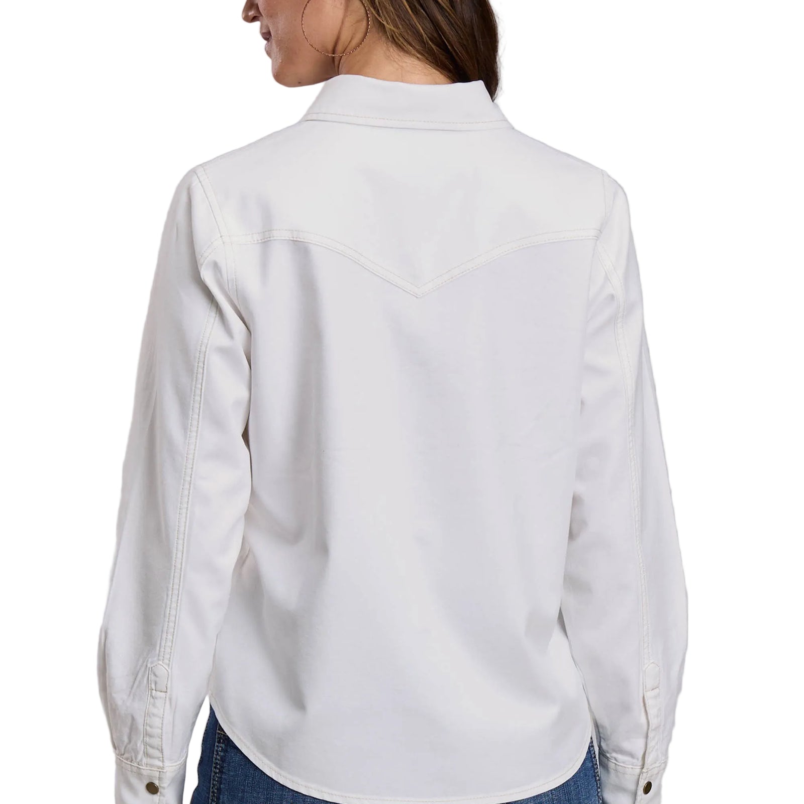 Light blue denim jacket worn by a person on a gray background