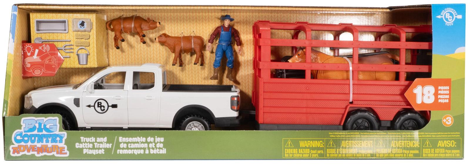 Toy truck and trailer set with animals and figures on a cardboard box