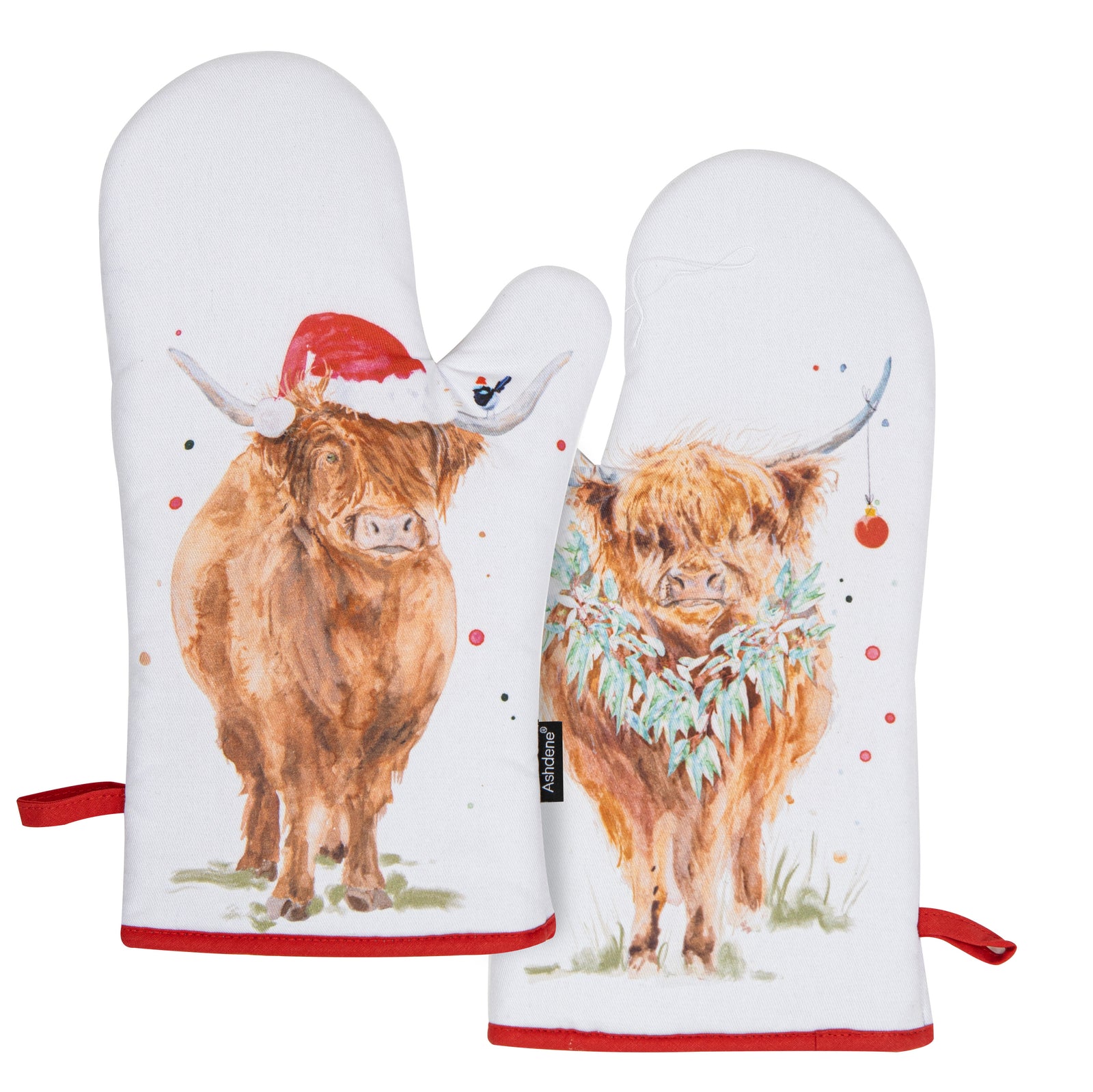 Ashdene Coo Christmas 2pk Oven Mitt. Pair of oven mitts with highland cow designs on a white background