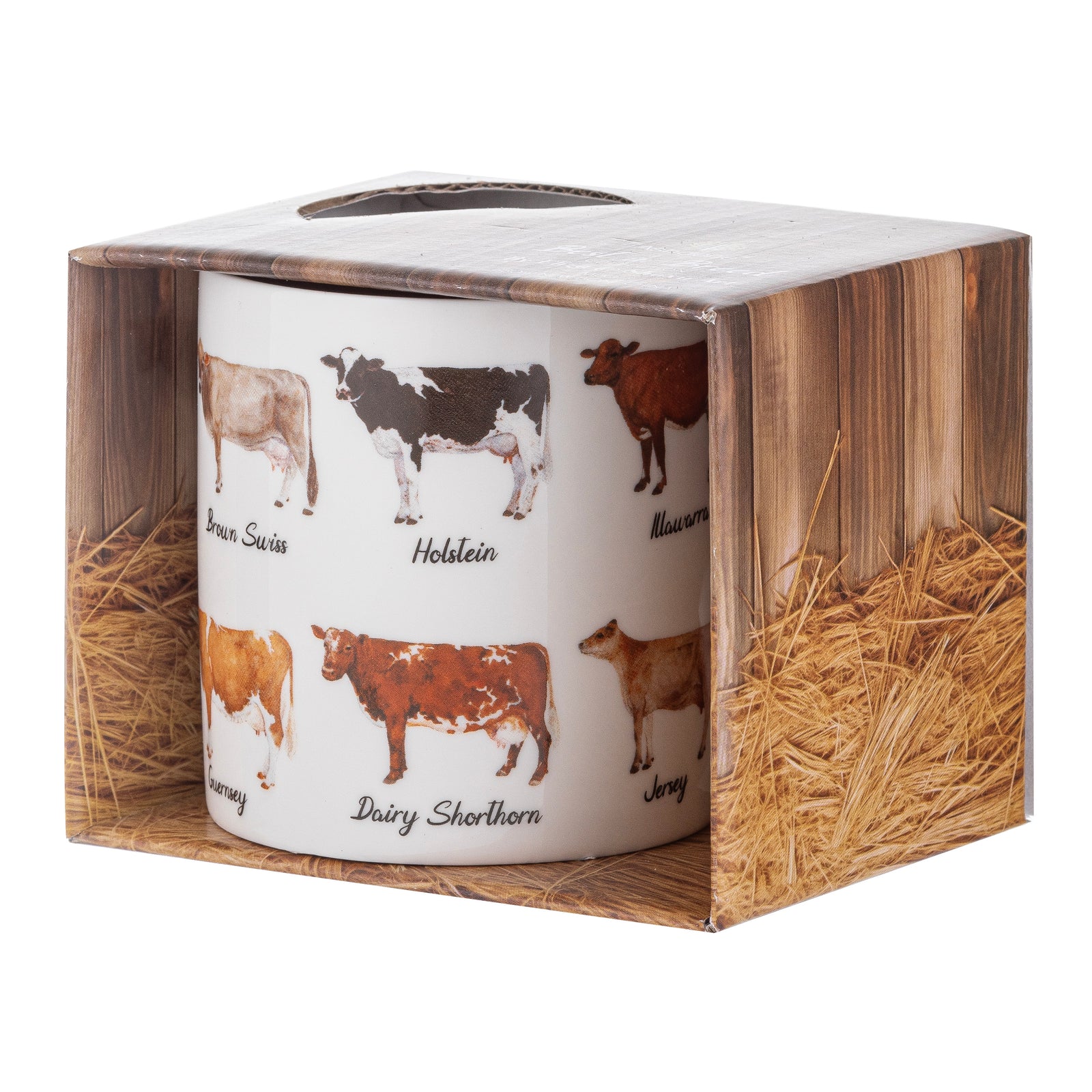 Mug with cow illustrations in a wooden box with hay