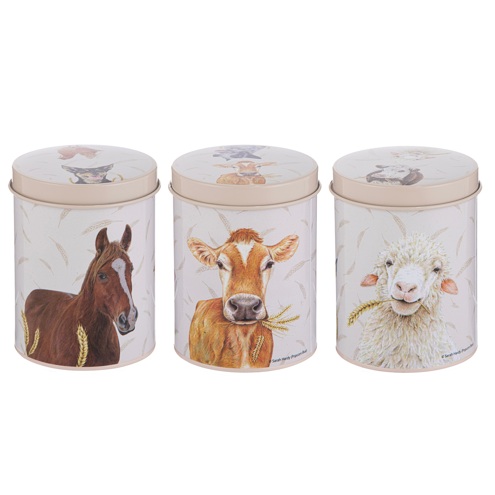 Three cylindrical metal canisters with animal-themed designs on lids against a white background