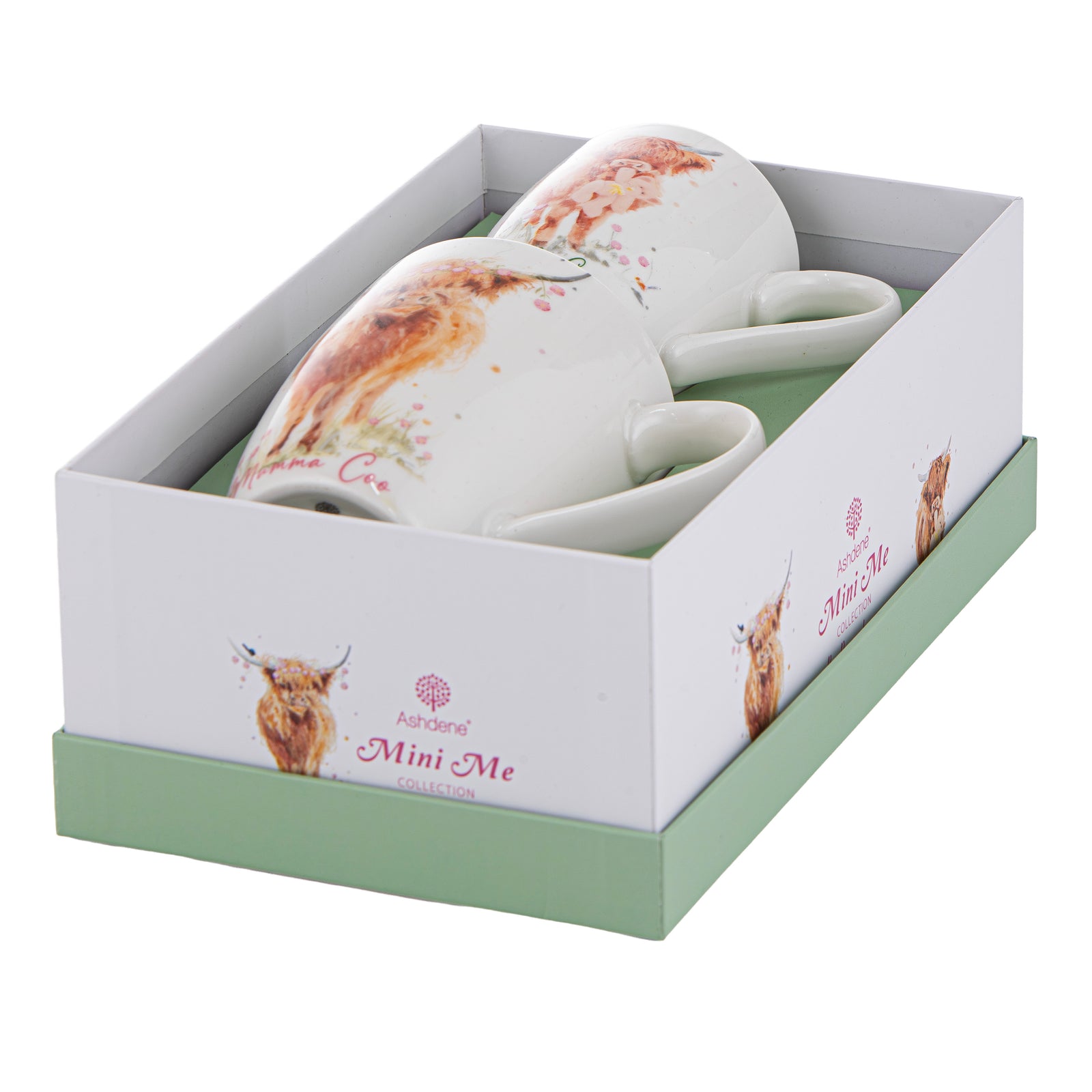 Two ceramic mugs with a highland cow design in a branded box.