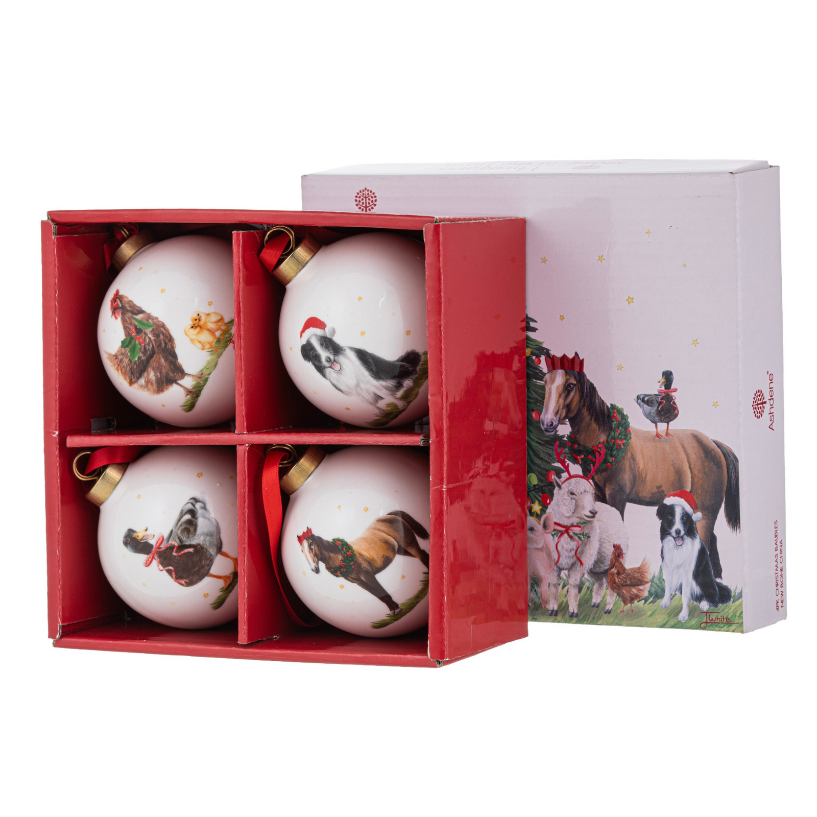 A boxed product package titled "Christmas at the Farm" by Ashdene, shown at an angle on a white background. The box is primarily red on the lower half with a white top panel featuring a holiday illustration of cows, a Christmas tree, and gifts.