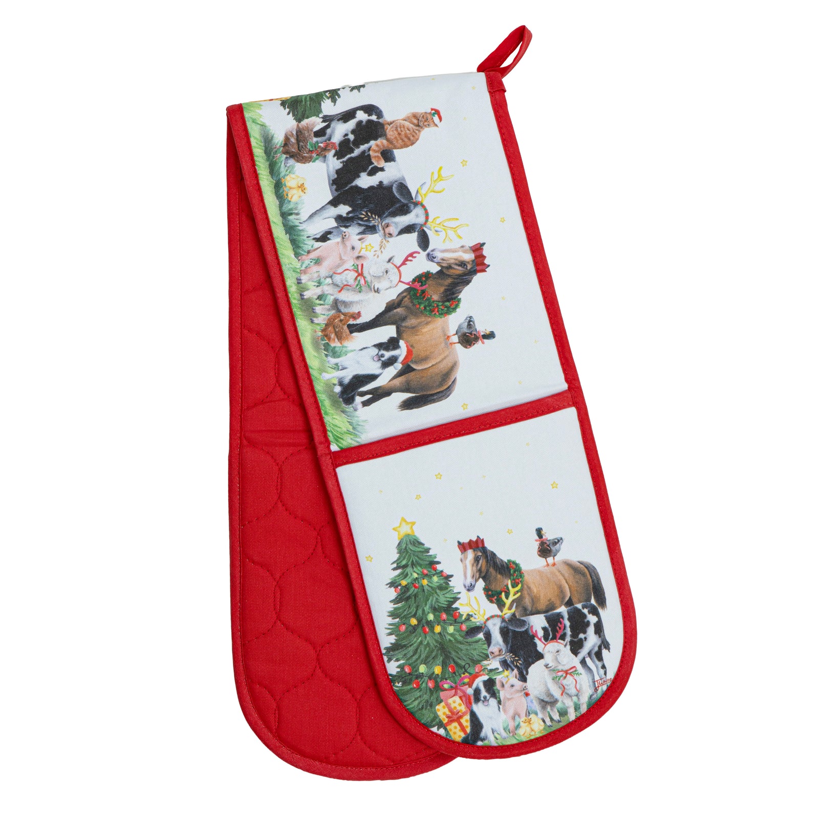 A red quilted oven mitt with a holiday-themed print featuring horses, cows, and a Christmas tree on a white background.