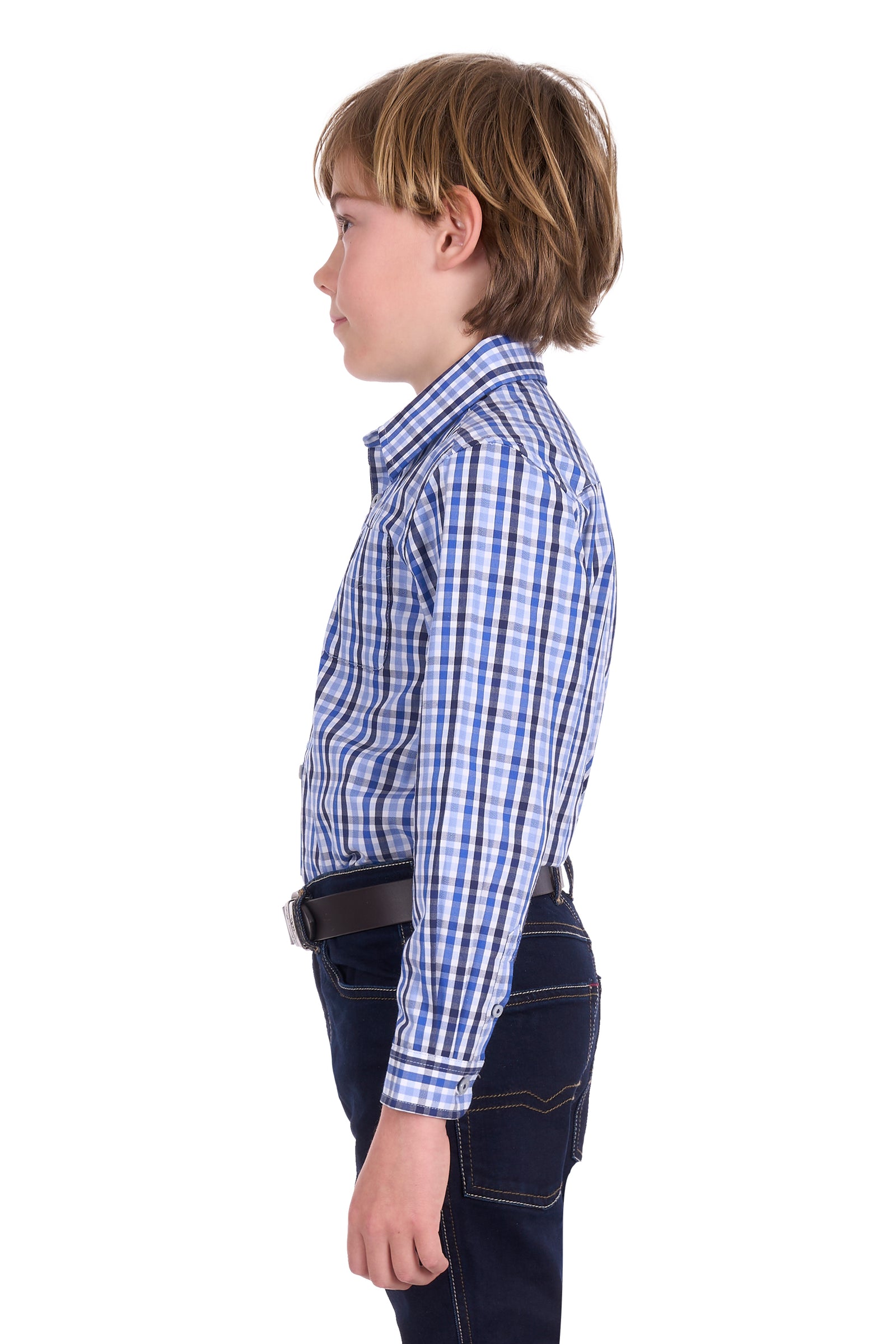 Child wearing a blue plaid shirt and dark jeans on a white background