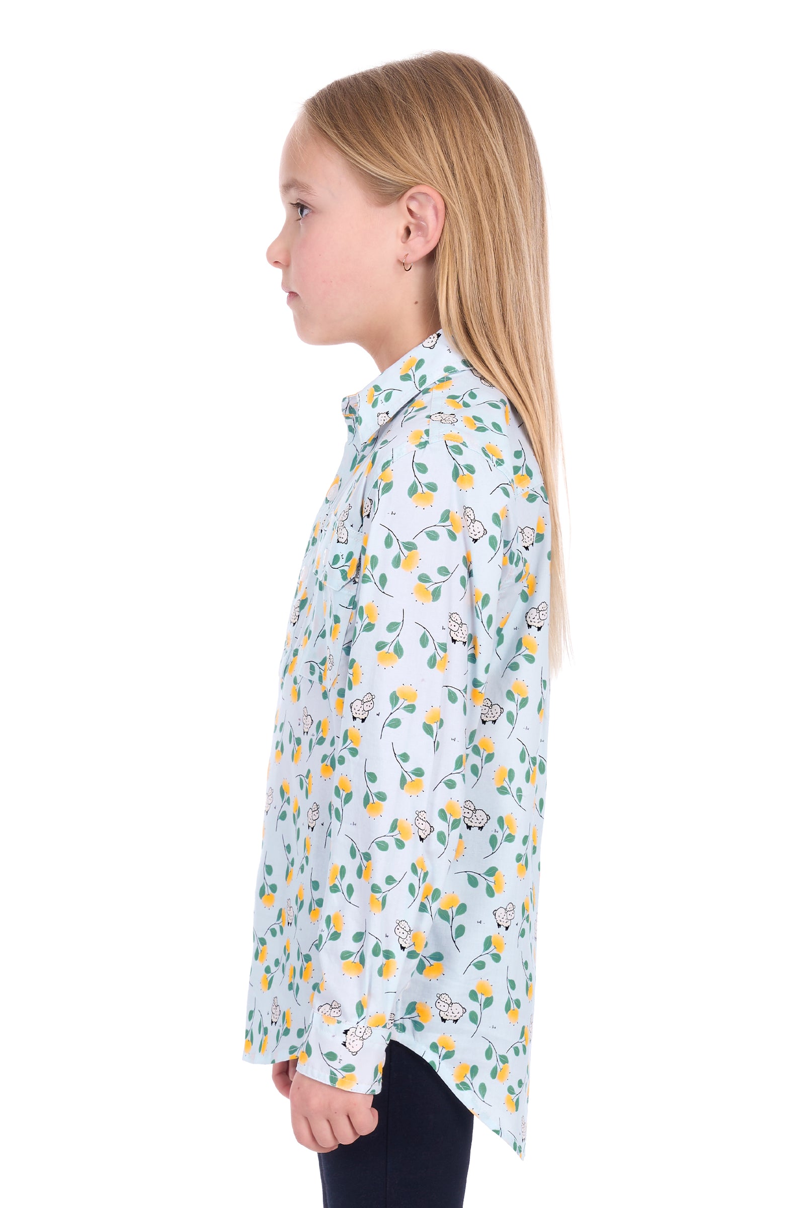 Girl wearing a floral patterned shirt on a white background
