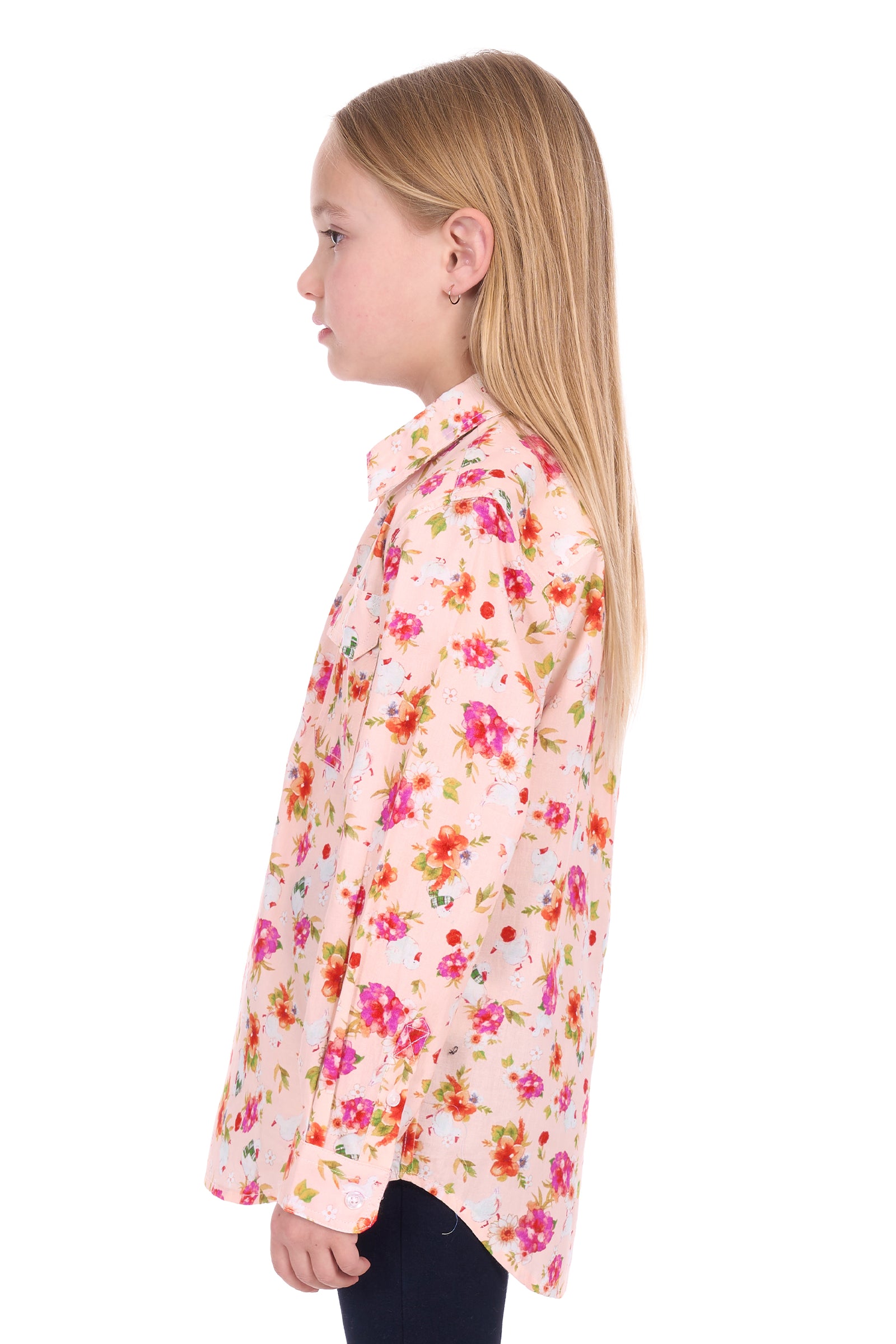 Girl wearing a floral shirt on a white background