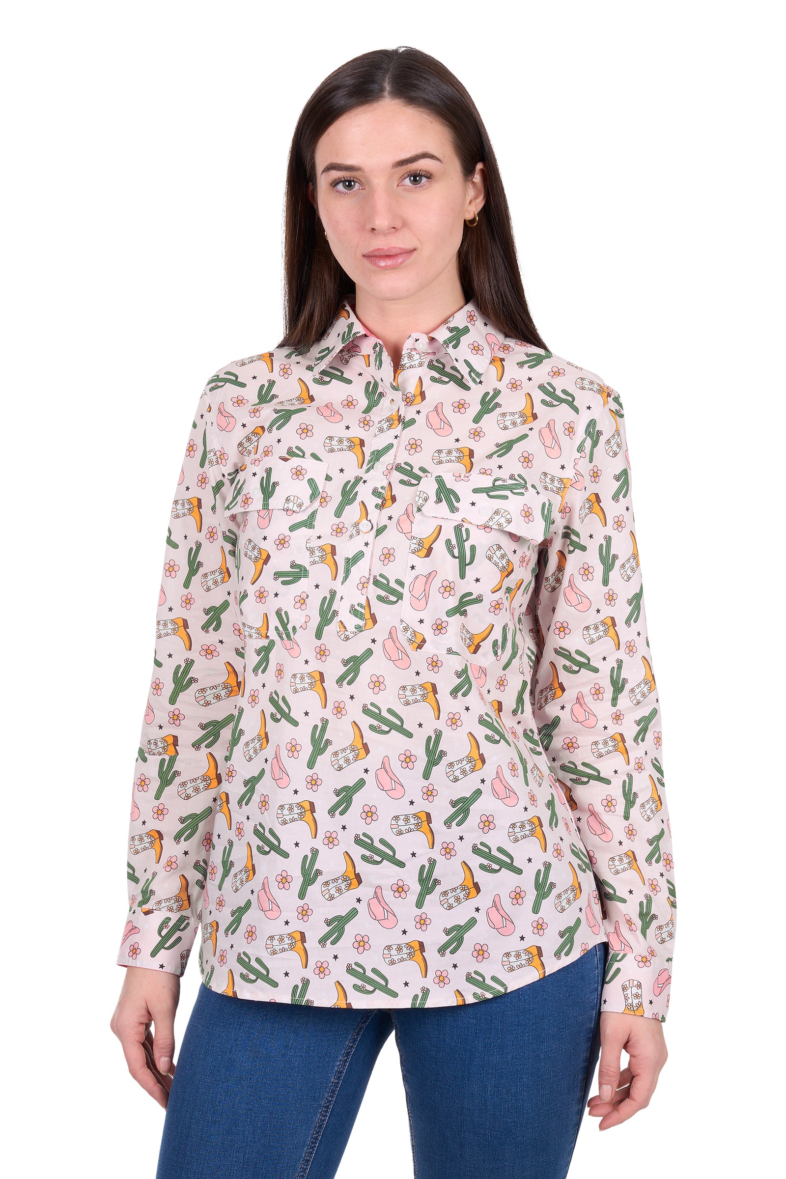 Woman wearing a floral patterned shirt with cacti and parrots on a white background