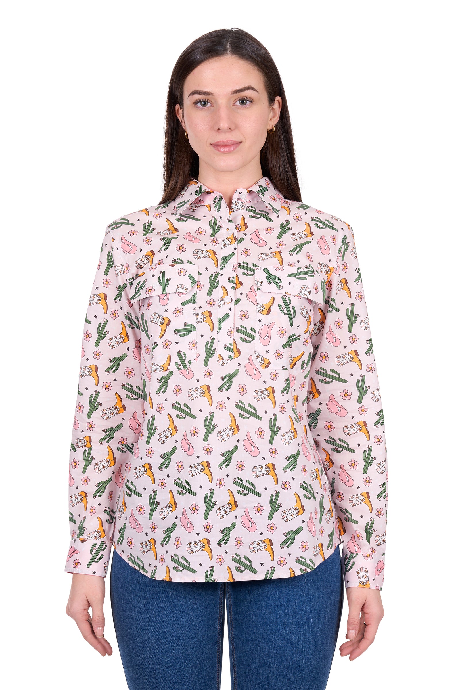 Woman wearing a floral blouse with cactus and flower pattern on a white background