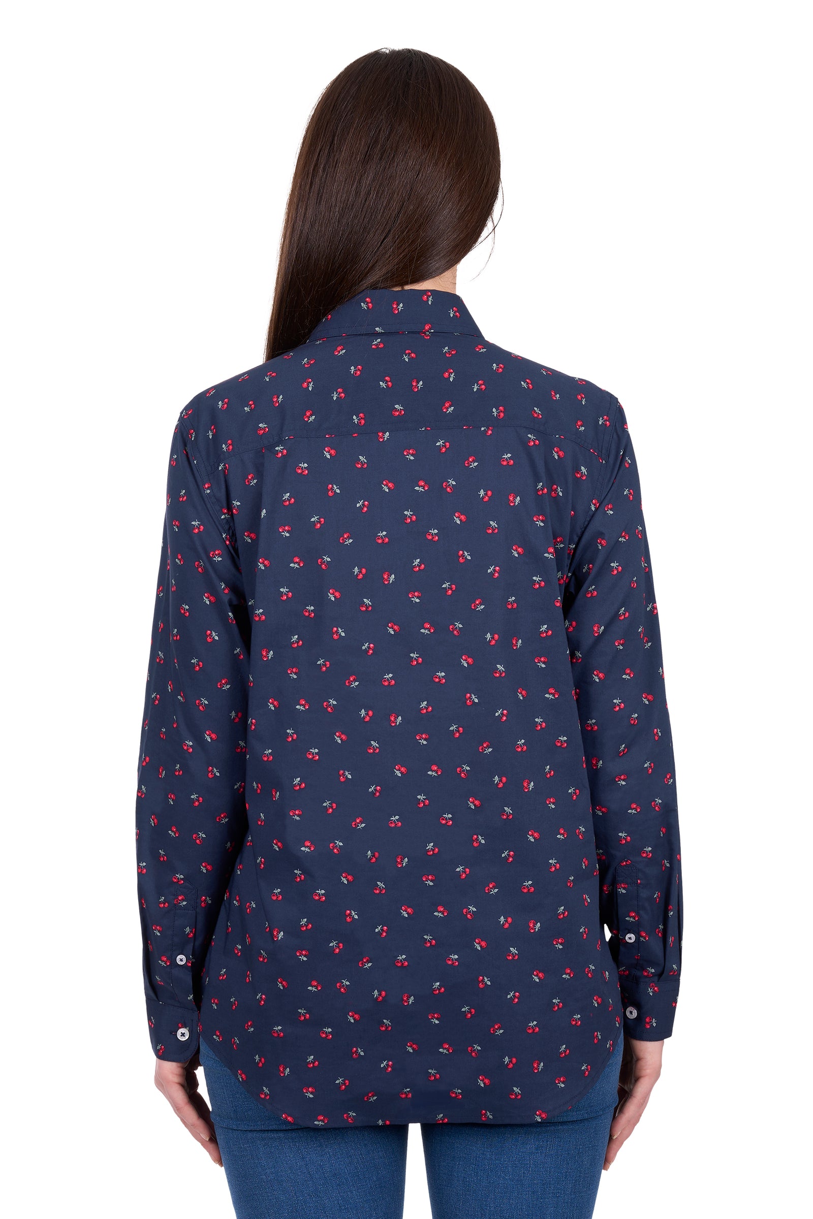 Woman wearing a navy blue shirt with a subtle pattern on a white background