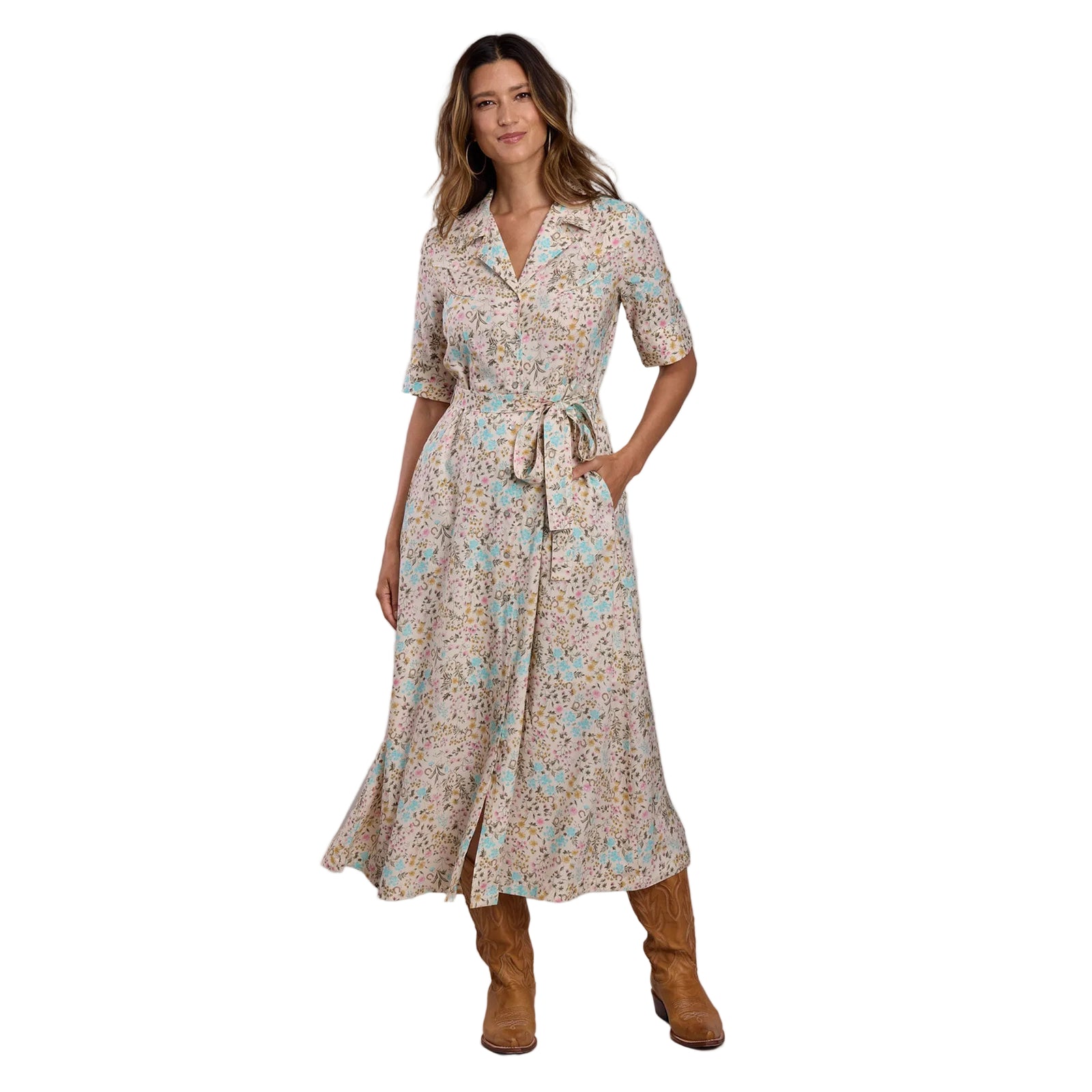 Woman wearing a floral dress with a plain background