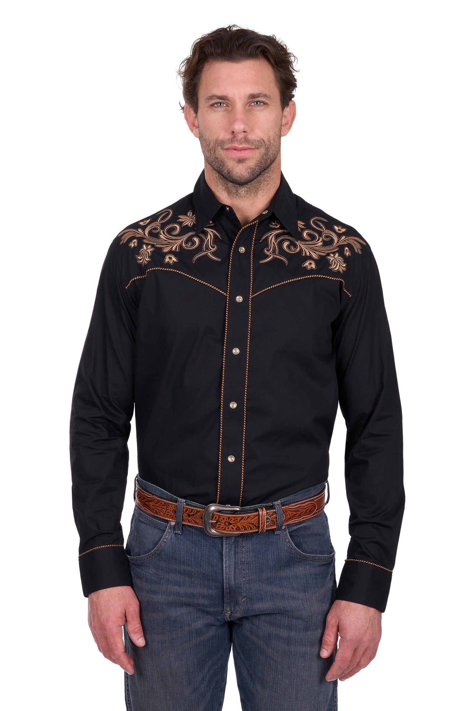 Man wearing a black embroidered shirt with gold details on a white background