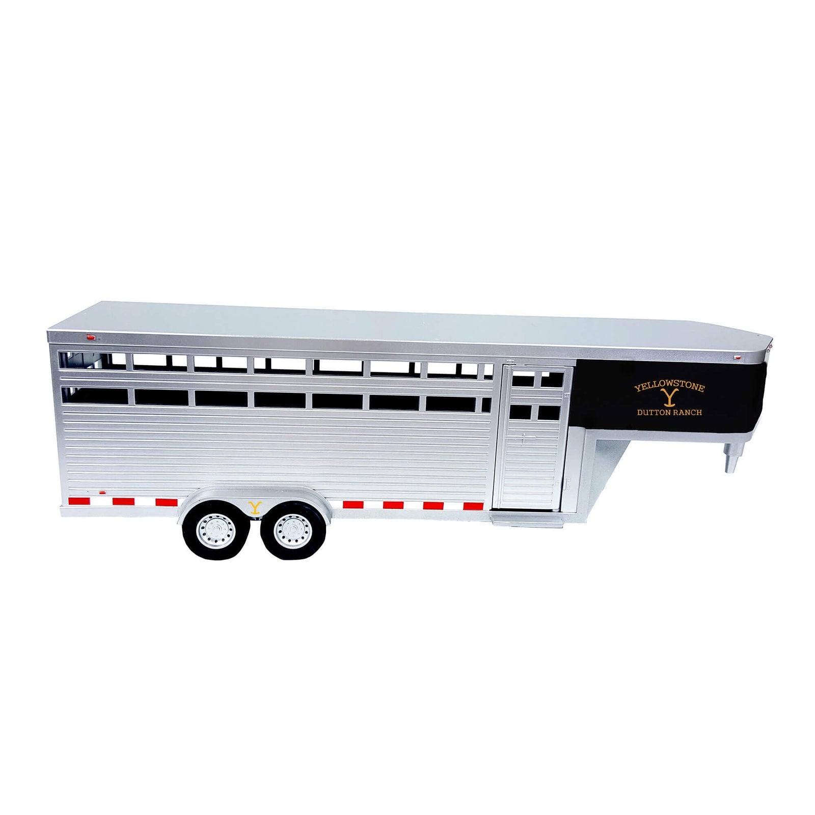 Big Country Toys Dutton Ranch Trailer. A 1:20 scale replica of a Dutton Ranch Horse Trailer toy, predominantly gray in color with red and white stripes on the sides, featuring detailed compartments and realistic textures.