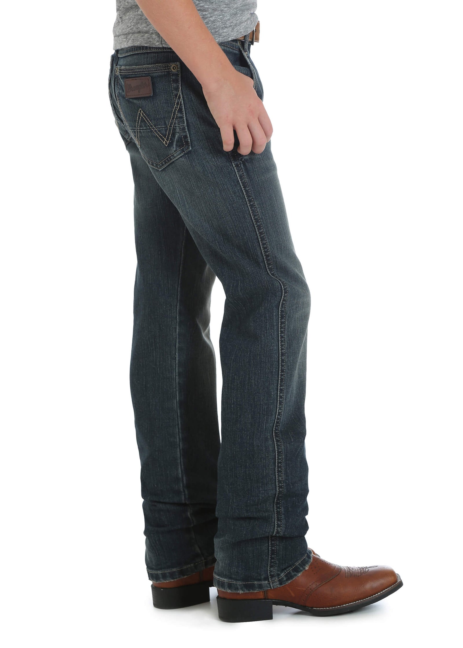 A pair of Wrangler boy's retro slim fit straight leg jeans, featuring a dark wash and traditional five-pocket design.