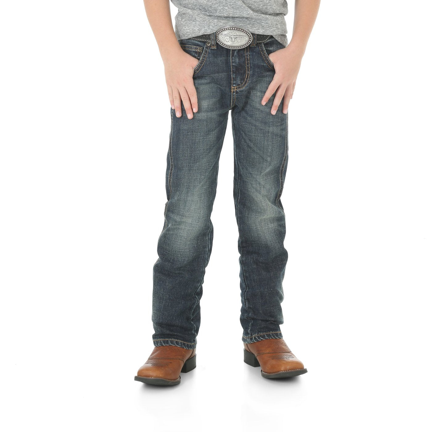 A pair of Wrangler slim straight leg jeans for boys, with a mid-rise waist and traditional five-pocket design, displayed against a white background.