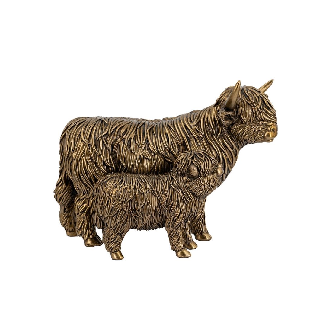 A decorative figurine of a Highland cow and its calf in a textured metallic bronze finish, set against a plain white background.