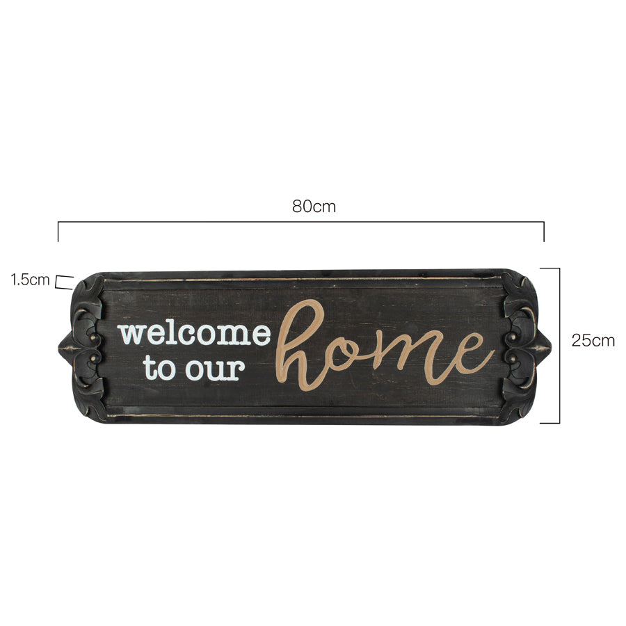 80cm Nero ‘Welcome to Our Home’ Carved Wall Art. Decorative sign with 'welcome to our home' text and dimensions on a white background