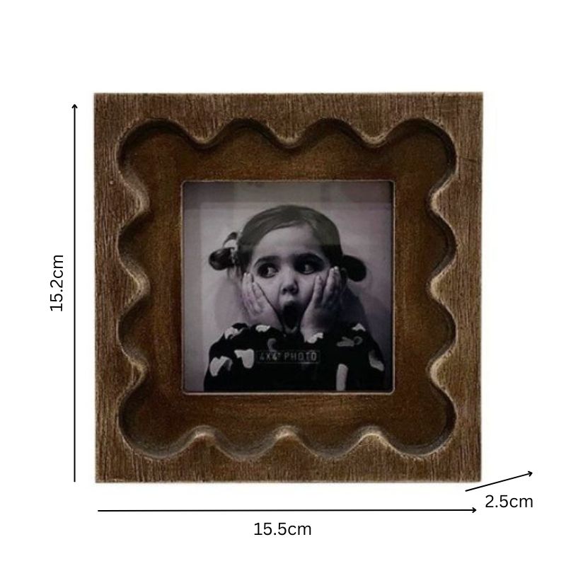 Designer Photo Frame. Wooden photo frame with a black and white photo of a child, showing dimensions on a white background.