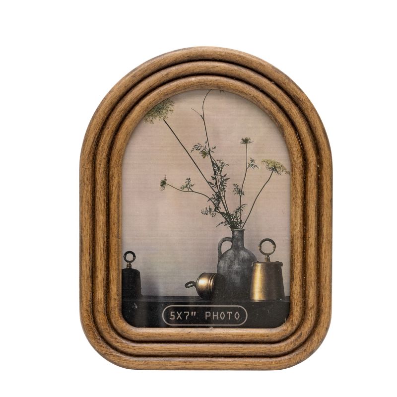 5×7″ Contemporary Arch Style Photo Frame. Wooden photo frame with a decorative interior featuring a vase and plants on a white background