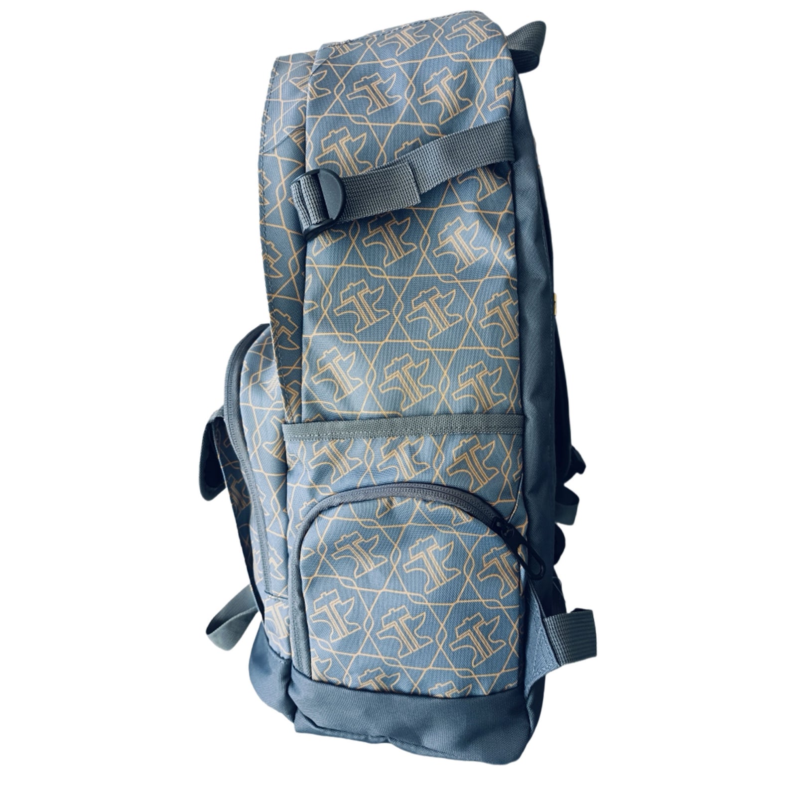 Tin Haul Backpack. Blue backpack with geometric pattern on a white background
