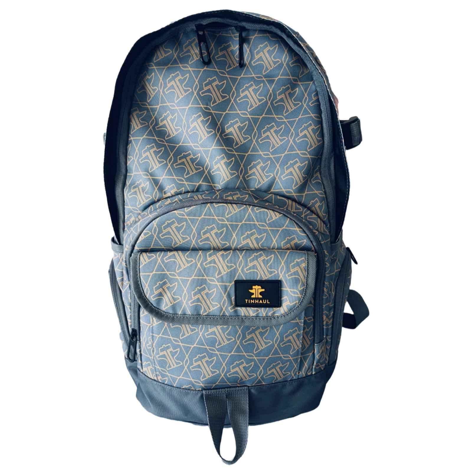 Tin Haul Backpack. Blue backpack with geometric pattern on a white background