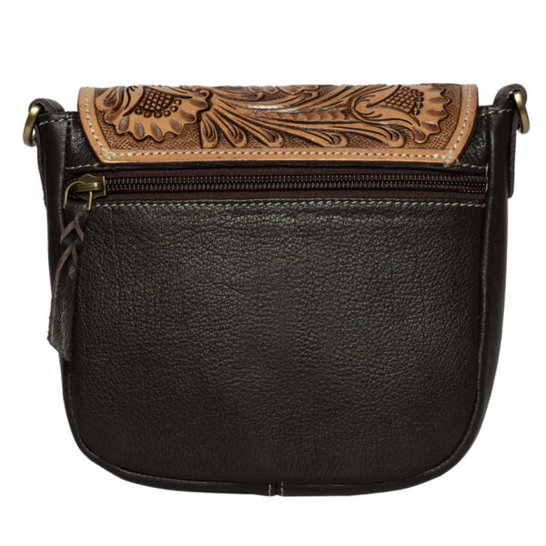 The Design Edge Women's Bullhead Sling Bag. Black leather handbag with floral tooled leather flap on a white background