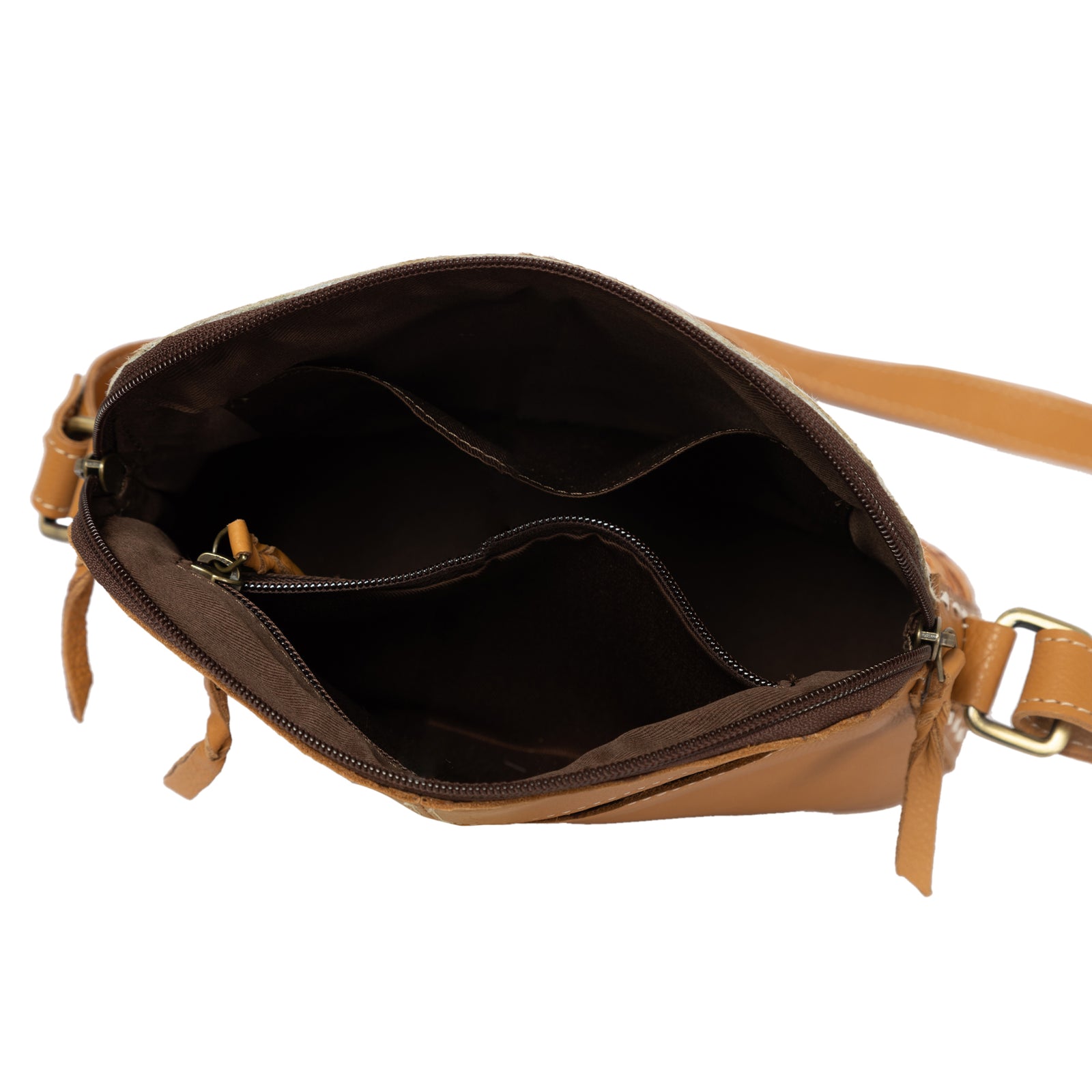 Brown leather bag with a strap on a white background