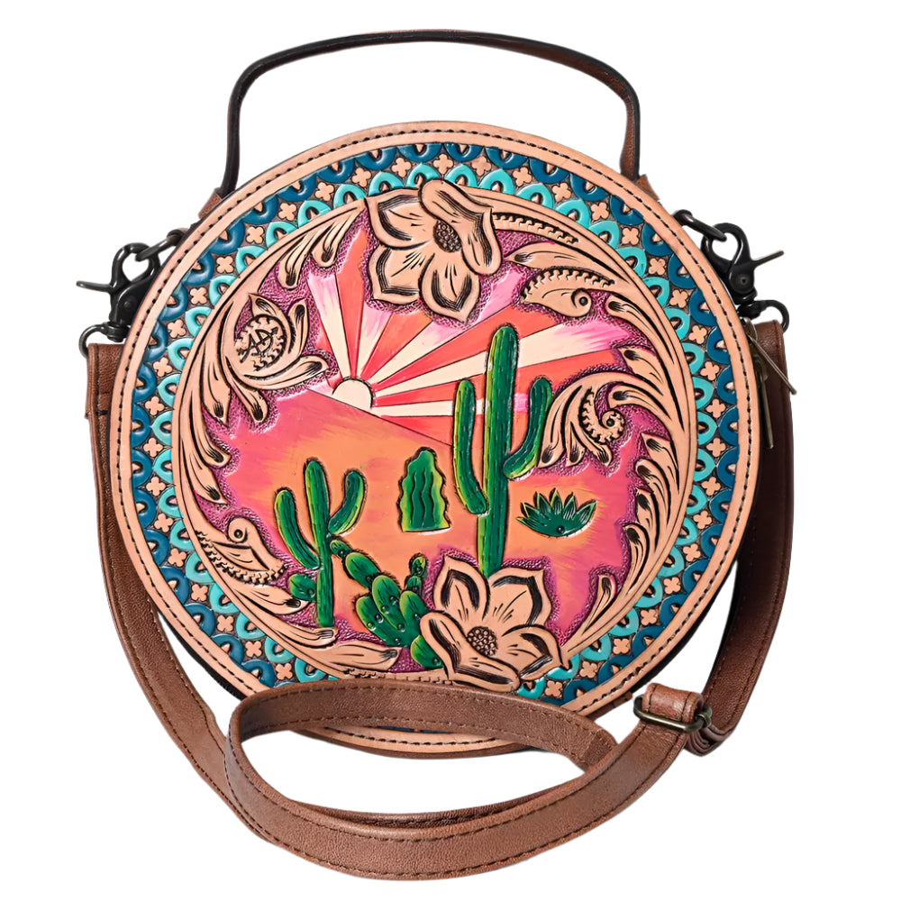 American Darling tooled leather western style handbag with a canteen shape, featuring a colorful floral and cactus pattern, solid brown background, and a brown leather shoulder strap.