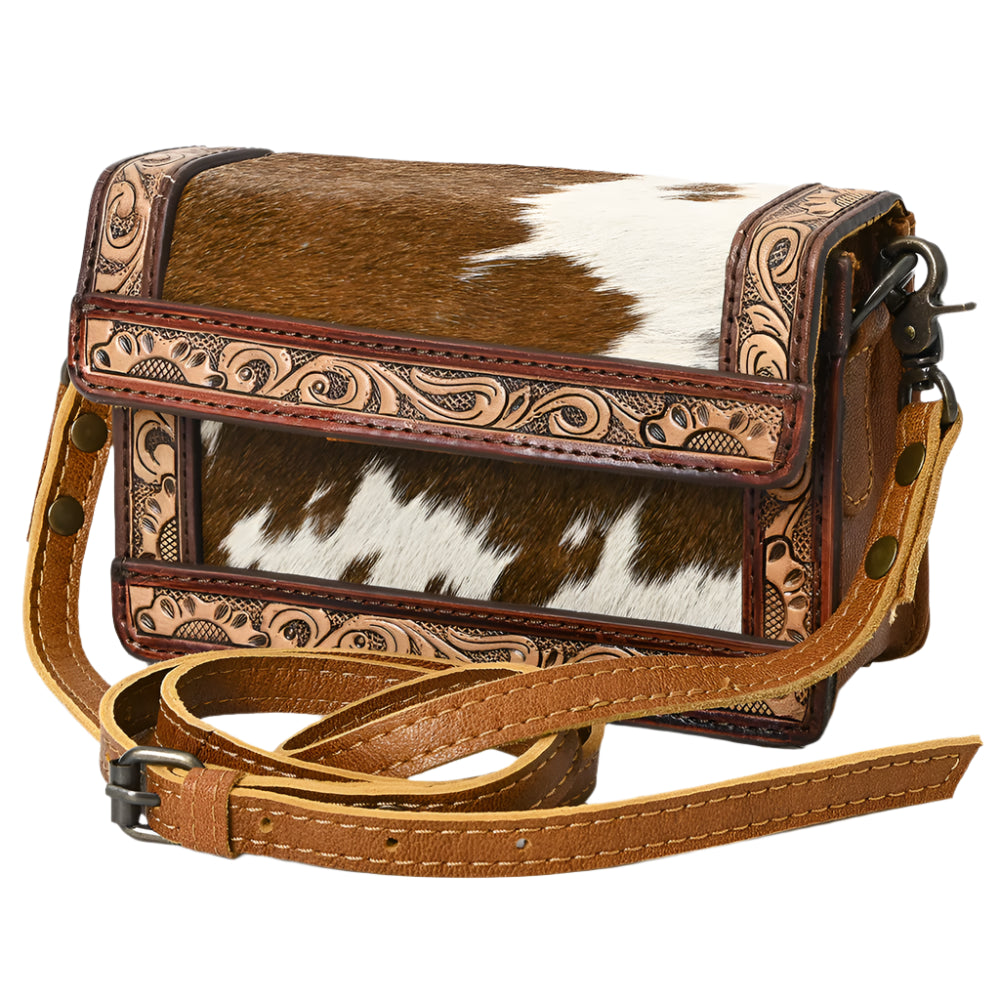 American Darling Brown and white cowhide leather western bag with intricate patterns on a white background