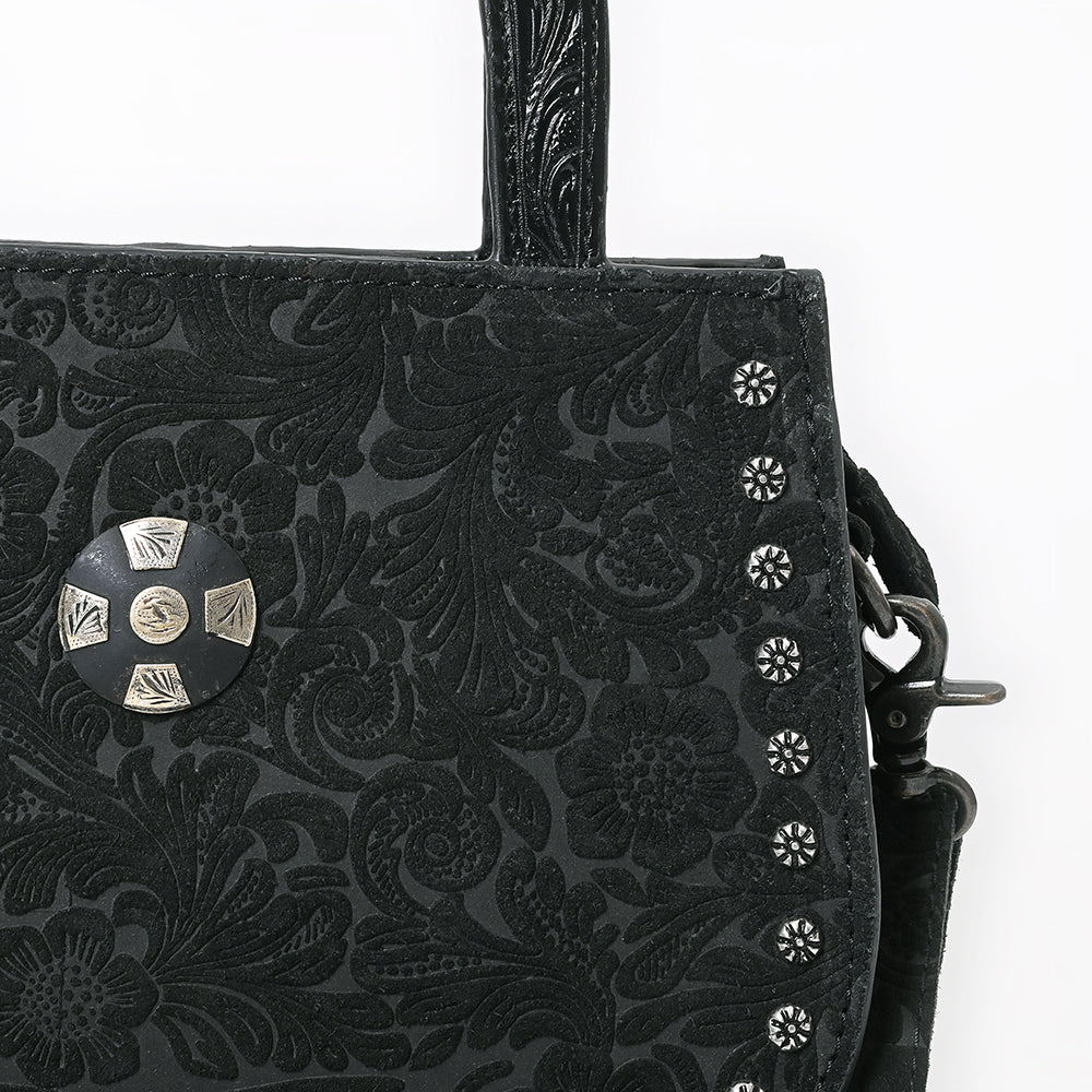 American Darling Suede Western Tote. Black floral patterned bag with decorative studs on a white background