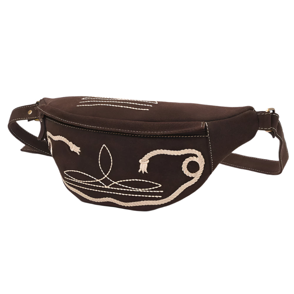 An American Darling brown western style fanny pack with a boot stitch pattern in white and beige on the front, featuring an adjustable shoulder strap and metal zipper.