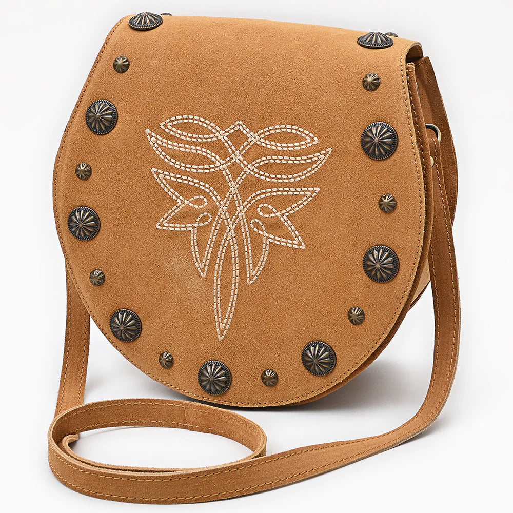 American Darling Suede Boot Stitch Western Handbag. Brown leather bag with floral embroidery and decorative studs on a white background