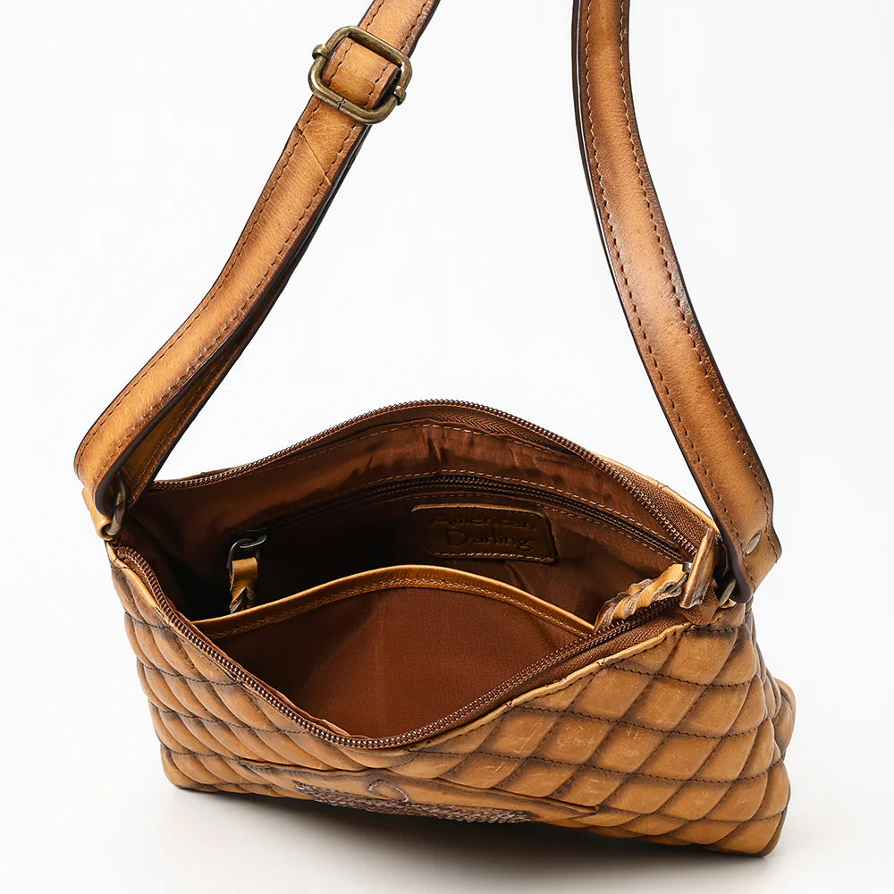 American Darling Western Stitch Quilted Tan Leather Crossbody Bag. Brown quilted handbag with a strap on a white background