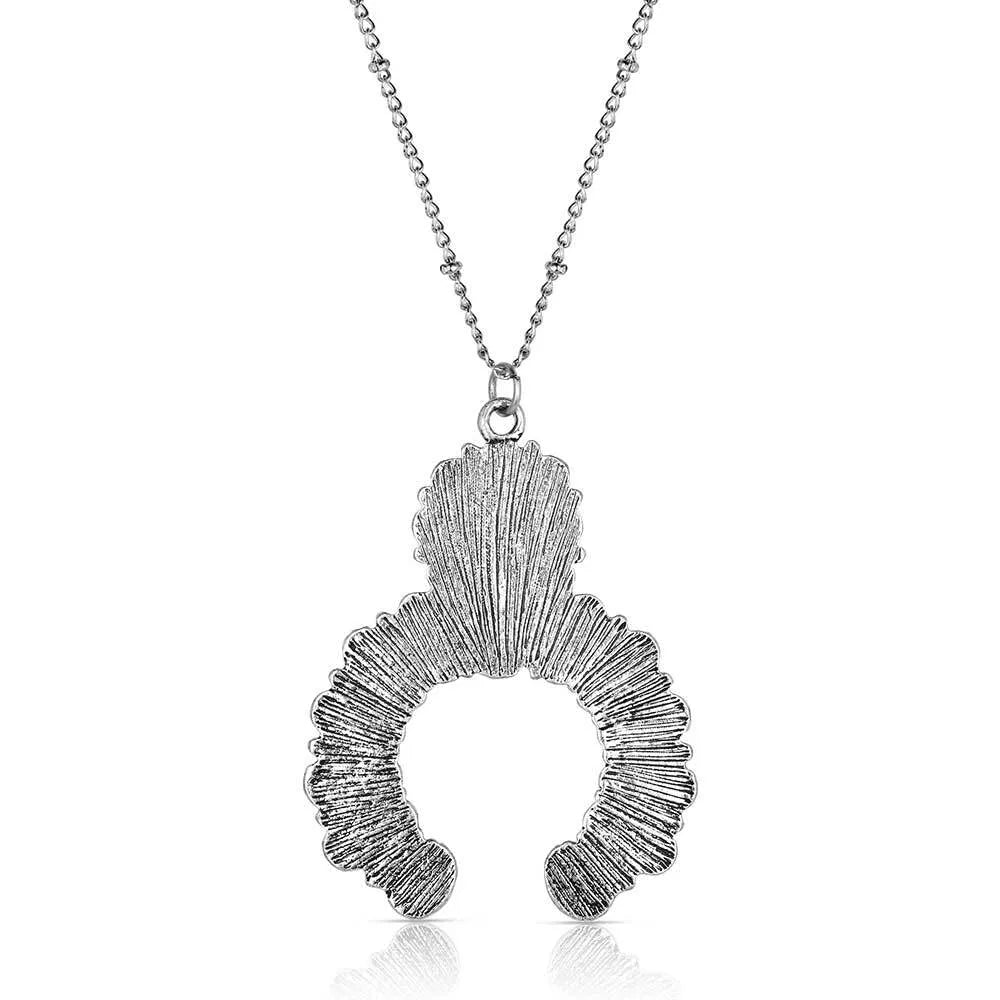 Silver necklace with a unique pendant on a white background